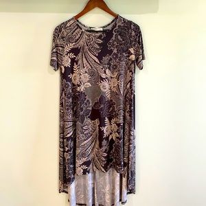 This flowy dress is by Blooms and is a size medium
